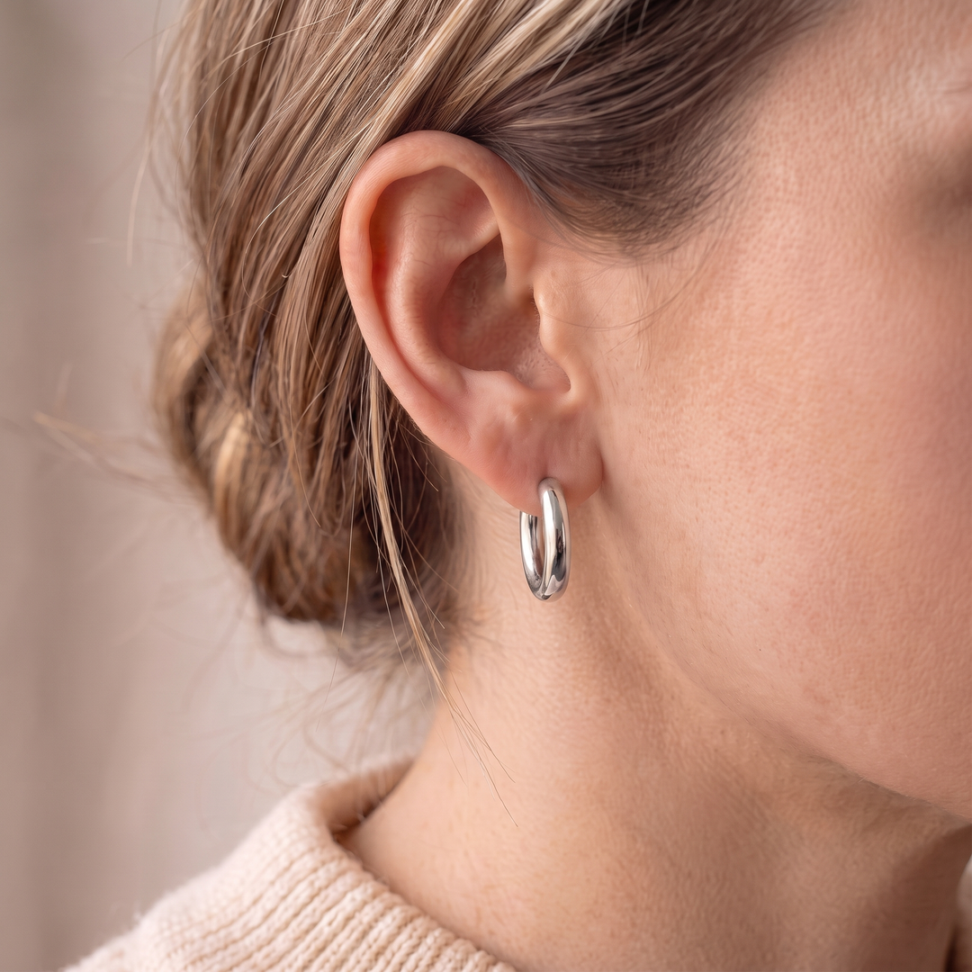 "London" Chunky Huggie Hoops — Silver, worn