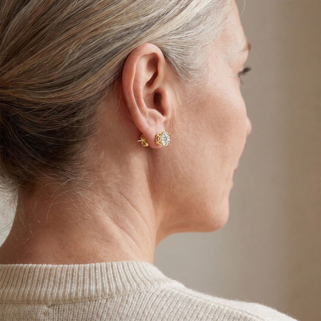 Ascona Heart-Prong Moissanite Studs — Gold, worn