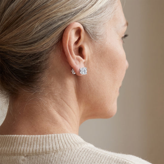 Ascona Heart-Prong Moissanite Studs — Silver, worn