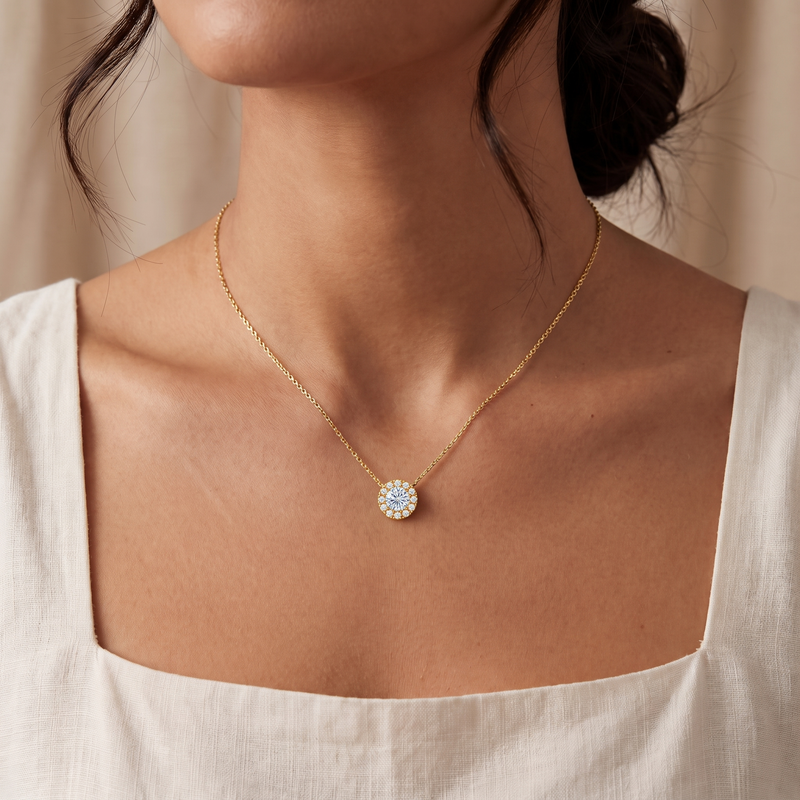 Geneva - gold, worn at the collarbone