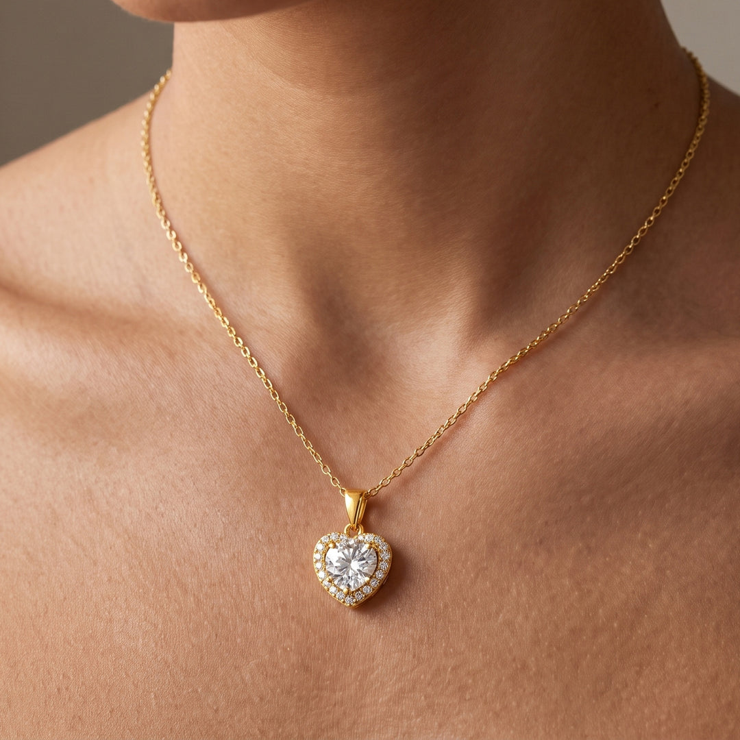 Helsinki Moissanite 1ct Heart Halo Necklace — Gold, worn at the collarbone