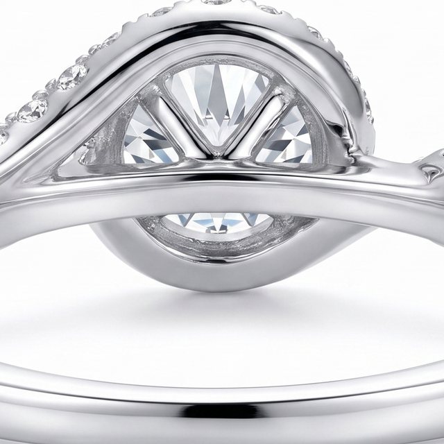 The setting of a moissanite ring seen from the side