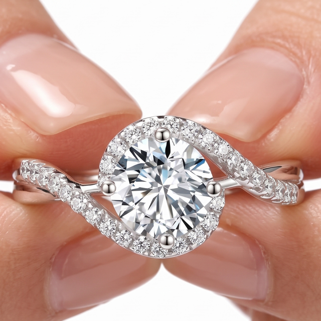 A moissanite ring held in the hand
